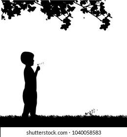 Boy blowing the dandelion in park under the tree silhouette, one in the series of similar images