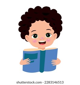 A boy with a book in his hands is reading a book.