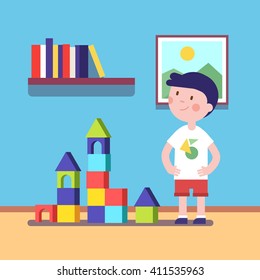 Boy Build A Castle With Wooden Blocks Building Game. Proud Kid Character. Modern Flat Vector Illustration Clipart.