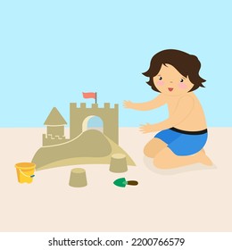 boy building a sand castle