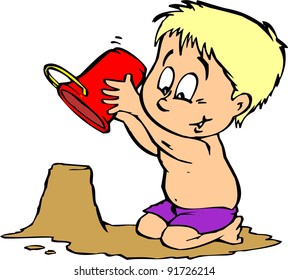 boy building sand castle