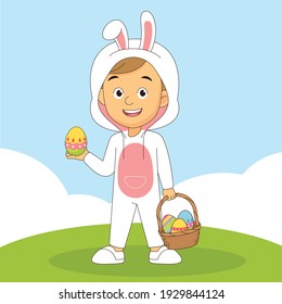 Boy in bunny costume and easter eggs in basket