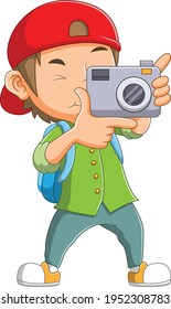 The boy with camera on his hand is trying to take a photo of the illustration