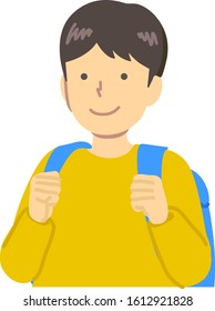 A boy carrying a backpack in yellow clothes