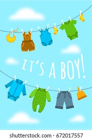 It's a boy cartoon cute greeting card. Baby shower party invitation vertical cover. Vector flat illustration. Newborn child's clothes hanging on ropes opposite blue sky. Sweet postcard for new mother