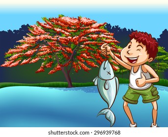 Boy in casual clothes caught a fish from the river