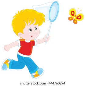 Boy catching a butterfly