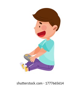 Juego de caracteres de niño sentado en el suelo con Joystick e iluminación vectorial de juegos de ordenador