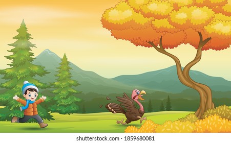 Niño persiguiendo un pavo en el parque