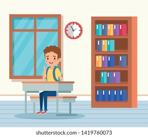 boy child in the classroom with desk and window