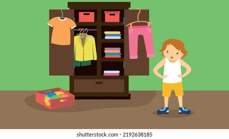 The boy chooses clothes in front of an open closet