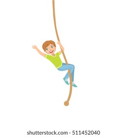 Boy Climbing A Rope In Physical Education Class In School