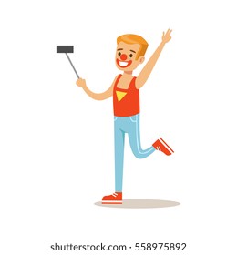 Boy In Clown Costume Taking Selfie With Selfie Stick, Children In Costume Party Illustration With Happy Smiling Kid At Festival Celebration