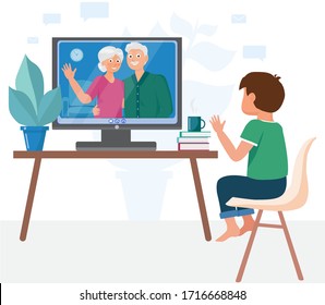Boy communicates by video call with his grandparents. Family video chat