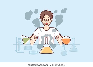 Boy conducts laboratory experiments mixing reagents from test tubes and gets scared having heard explosion. Funny schoolboy in laboratory wants to become chemist and conduct scientific experiments