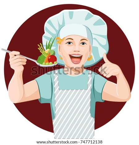 A boy cook holds a spoon with fresh vegetables. The child is thrilled with healthy food