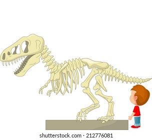 Boy with dinosaur skeleton at the museum