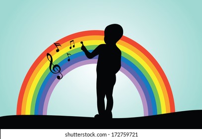 Boy drawing music notes on a rainbow