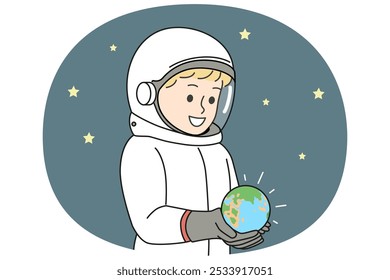 Boy dressed as astronaut is holding miniature planet earth, located in space with starry sky. Small child dreams of becoming astronaut and going on cosmos research expedition on shuttle