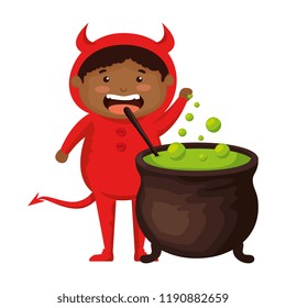 boy dressed up as a halloween devil with cauldron