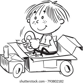 Boy driving with cardboard car