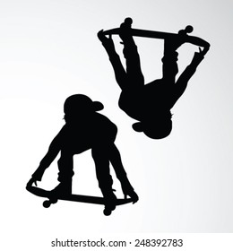boy driving skateboard vector silhouette