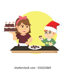 boy eating christmas cake