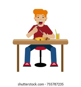 Boy eating spaghetti with meatballs