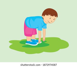 Boy exercising, touching toes outdoors