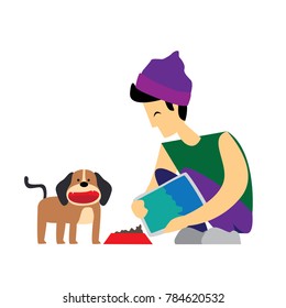 boy feeding the dog