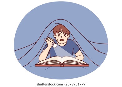 Boy with flashlight reads book lying under covers and is frightened by story described in fictional novel. Frightened boy with book enjoys reading fantasy literature in secret from parents