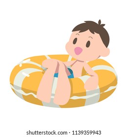 Boy floating on swim ring
