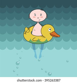 boy floats on an inflatable duck