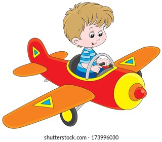 Boy flying a toy plane