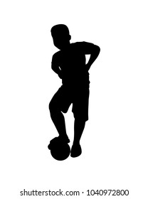 A boy with football silhouette vector