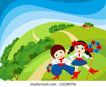 Boy with a girl dancing on the lawn on a sunny day