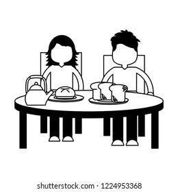 boy and girl eating breakfast
