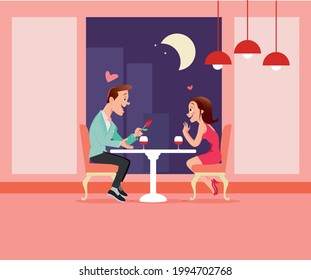 Boy And Girl Having A Romantic Dinner In A Fancy Restaurant Toasting With Wine