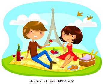 boy and girl having romantic picnic next to the Eiffel tower