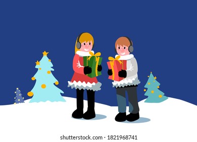 Boy and girl are holding their Christmas  gift box on the snow field and decorated tree.