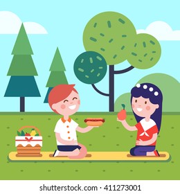 Boy and girl kids having lunch picnic on the park grass. Smiling kids characters. Modern flat vector illustration clipart.