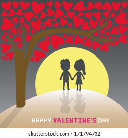 Boy and girl in love under the tree.