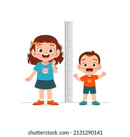 boy and girl measure height and compare grow progress