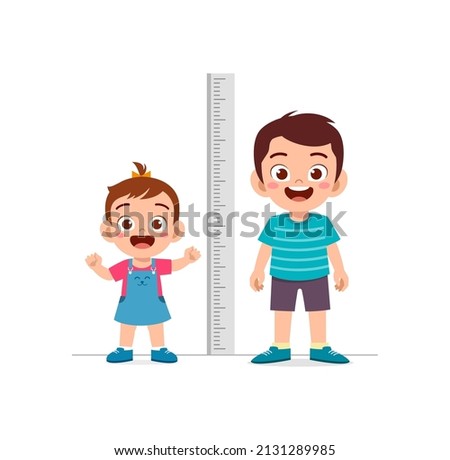 boy and girl measure height and compare grow progress