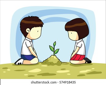 Boy and girl plant a tree together