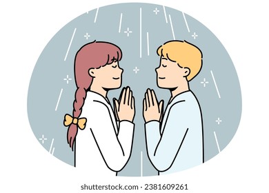 Boy, girl pray facing each other in church or at home. Children talk to God with prayers with palms together. Orthodox, catholic or protestant religion, faith, spirituality. Vector linear concept.