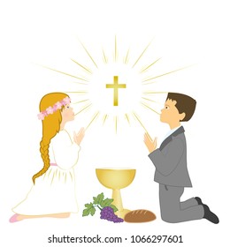 Boy and girl praying on knees and receives Eucharist.