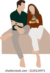 Boy and girl sitting next to each other with a cup of tea