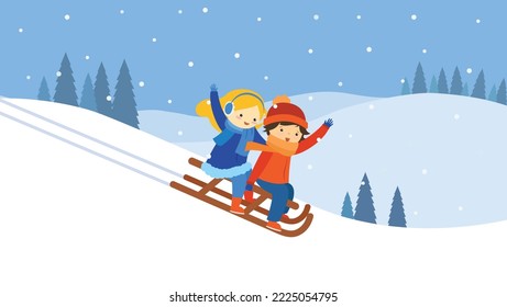 Boy and girl sledding down the hill