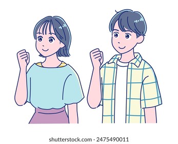 A boy and a girl smiling and pumping their fists